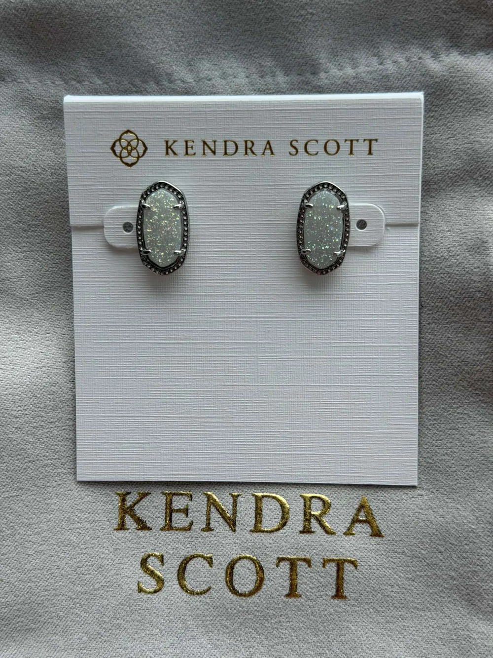 Kendra Scott silver earrings